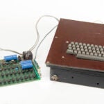 A vintage Apple computer built in the 1970s and signed by company co-founder Steve Wozniak.