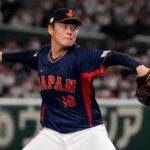 Yoshinobu Yamamoto of Japan pitches to Australia win the 1rst inning during their Pool B game at the World Baseball Classic at the Tokyo Dome Sunday, March 12, 2023, in Tokyo.