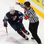 United States' John Farinacci (25) celebrates his goal against Finland during second-period IIHF World Junior Hockey Championship action in Edmonton, Alberta, Monday, Jan. 4, 2021.