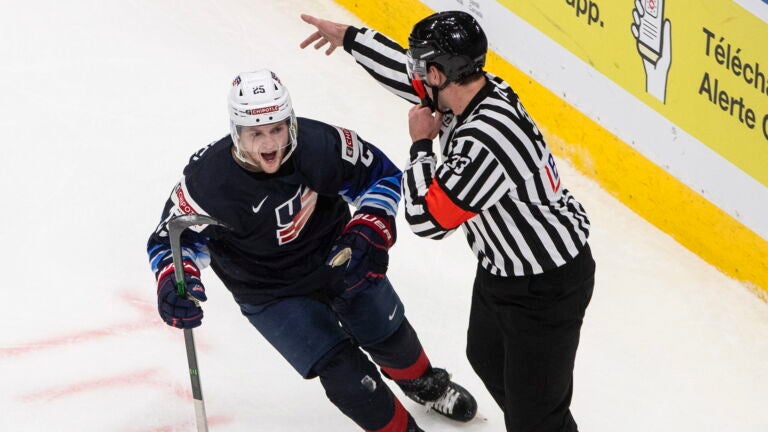 United States' John Farinacci (25) celebrates his goal against Finland during second-period IIHF World Junior Hockey Championship action in Edmonton, Alberta, Monday, Jan. 4, 2021.