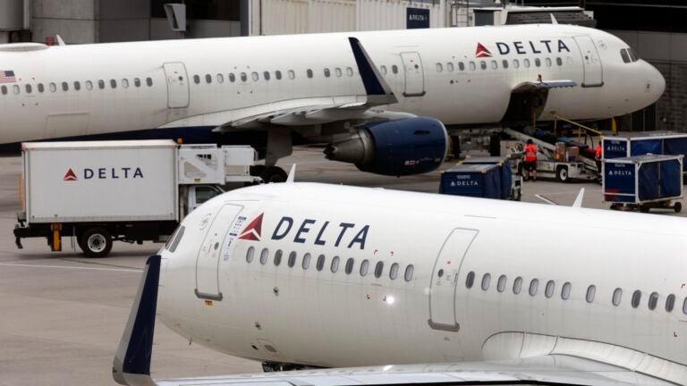A Delta Airlines plane leaves the gate on July 12, 2021, at Logan International Airport in Boston.