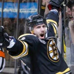 Boston Bruins center David Krejci (46) reacts after scoring a goal against the Vancouver Canucks in the second period during Game 3 of the NHL hockey Stanley Cup Finals, Monday, June 6, 2011, in Boston.