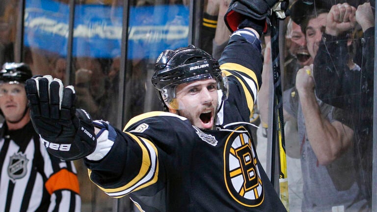 Boston Bruins center David Krejci (46) reacts after scoring a goal against the Vancouver Canucks in the second period during Game 3 of the NHL hockey Stanley Cup Finals, Monday, June 6, 2011, in Boston.