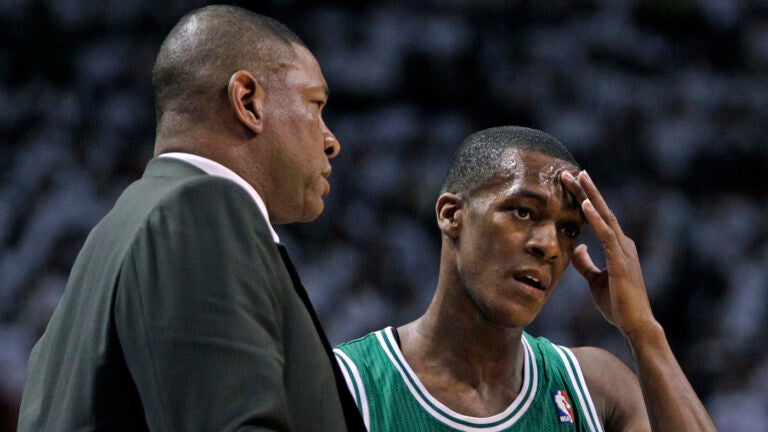 Celtics head coach Doc Rivers talks to point guard Rajon Rondo during the second half. The Boston Celtics visited the Miami Heat in Game One of the NBA Eastern Conference Semi-Finals at American Airlines Arena.