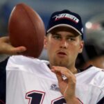 New England Patriots backup quarterback Tom Brady warms up on the sidelines before the game against the Detroit Lions at the Silverdome in Pontiac, Mich., Friday, Aug. 4, 2000.