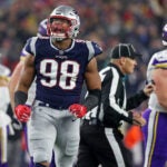 Patriots DL Trey Flowers lets out a howl after a second half stop of a Vikings running back.