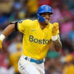 Jarren Duran #16 of the Boston Red Sox runs to first base during a game between the Kansas City Royals and the Boston Red Sox at Fenway Park in Boston on Tuesday, Aug. 8, 2023.
