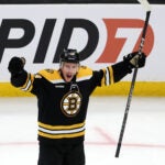 Boston Bruins center Charlie Coyle (13) celebrates his game tying goal scored in the third period. The Boston Bruins host the Toronto Maple Leafs on April 6, 2023 at TD Garden in Boston, MA.