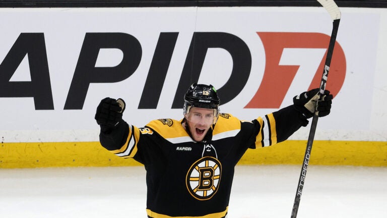 Boston Bruins center Charlie Coyle (13) celebrates his game tying goal scored in the third period. The Boston Bruins host the Toronto Maple Leafs on April 6, 2023 at TD Garden in Boston, MA.