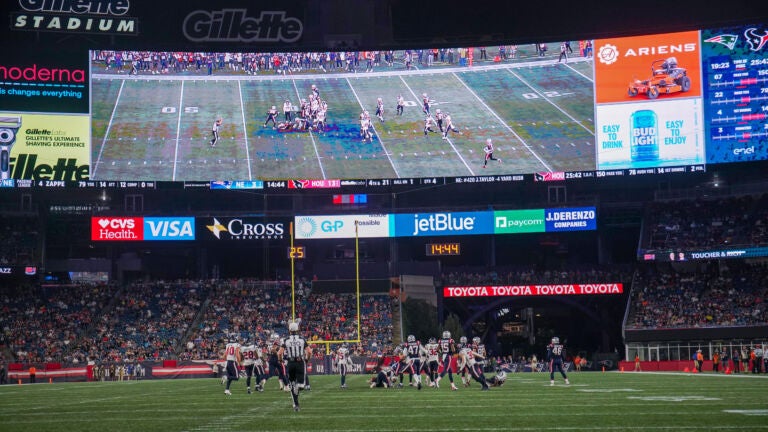 The New England Patriots new giant scoreboard had plenty of room for ads as well as the game. The New England Patriots host the Houston Texans in a NFL pre-season exhibition game on August 10, 2023 at Gillette Stadium in Foxboro, MA.