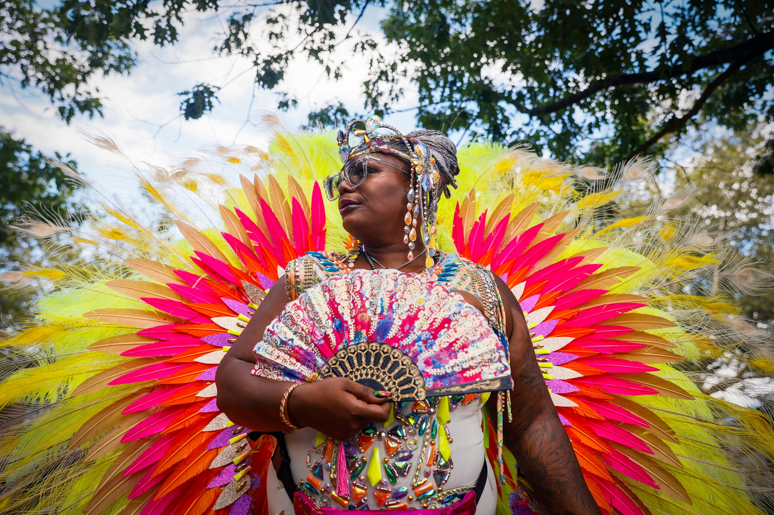 Someone attending the Carribean American Carnival.