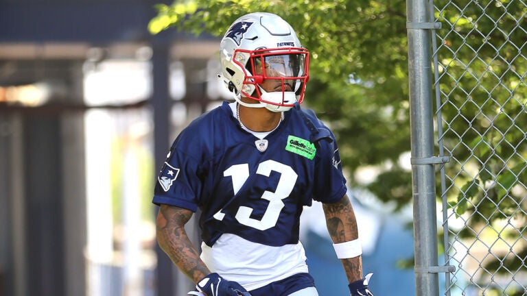 The Patriots held their first workouts at the training camp at Gillette Stadium. Jack Jones arrives on the field.