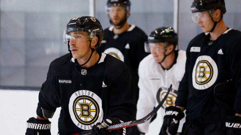 Brad Marchand runs through a drill during Bruins captain’s practice at Warrior Arena.