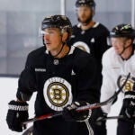 Brad Marchand runs through a drill during Bruins captain’s practice at Warrior Arena.