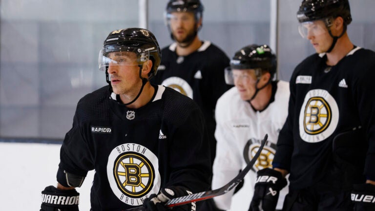 Brad Marchand runs through a drill during Bruins captain’s practice at Warrior Arena.