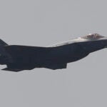 A Lockheed Martin F-35 Lightning II performs a demonstration flight.