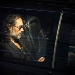 Russell Brand leaves the Troubabour Wembley Park theater in northwest London.