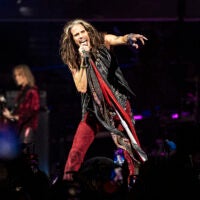 Steven Tyler of Aerosmith performs on stage.