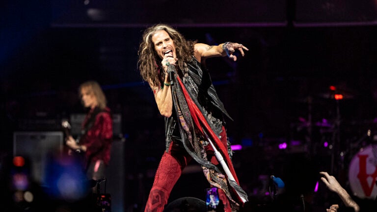Steven Tyler of Aerosmith performs on stage.