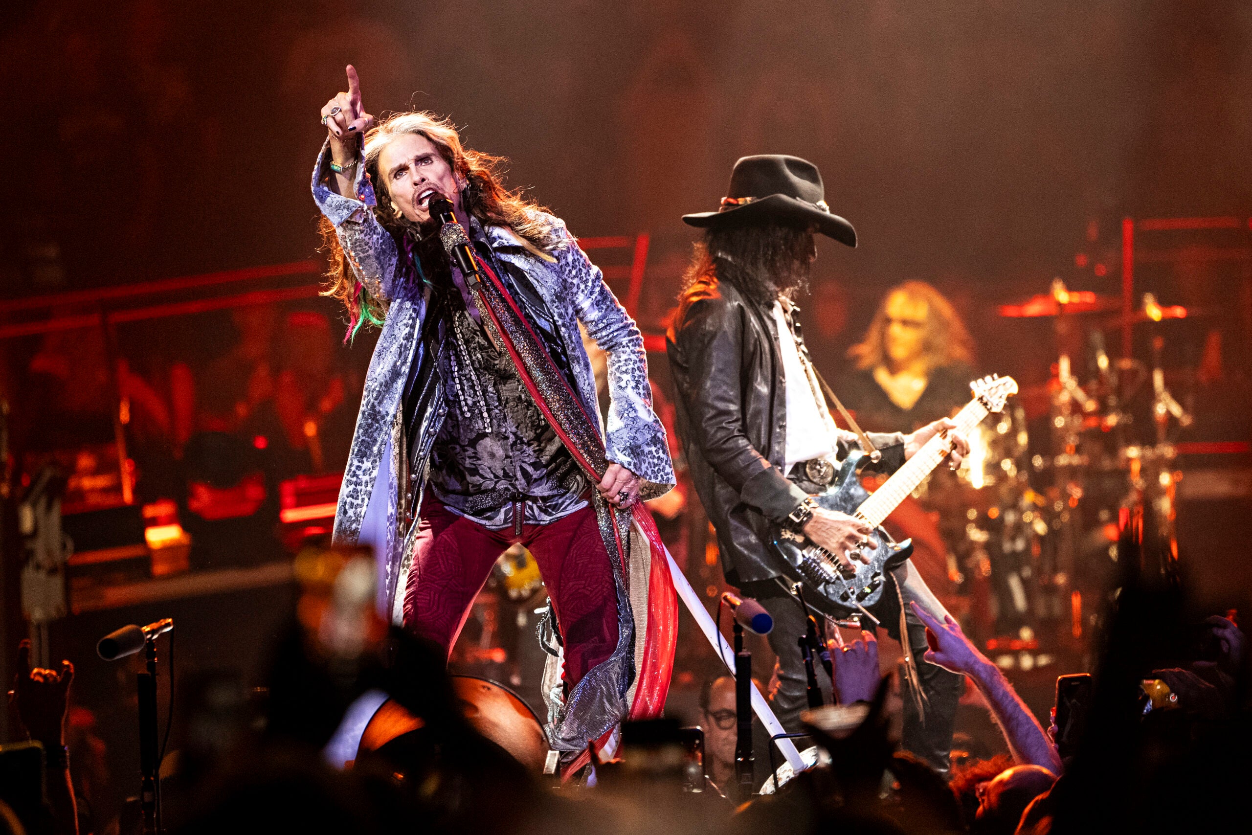 Steven Tyler and Joe Perry of Aerosmith perform on stage.