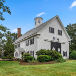 Historic white barn transformed into single family home.