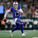 Buffalo Bills quarterback Josh Allen attempts a pass.