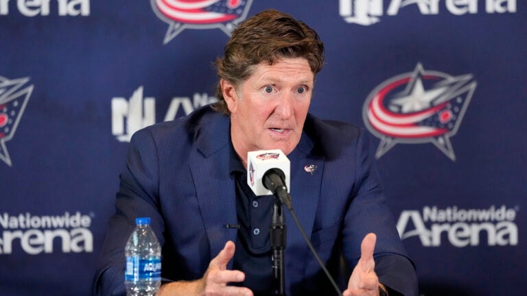 Former Columbus Blue Jackets coach Mike Babcock speaking to reporters.