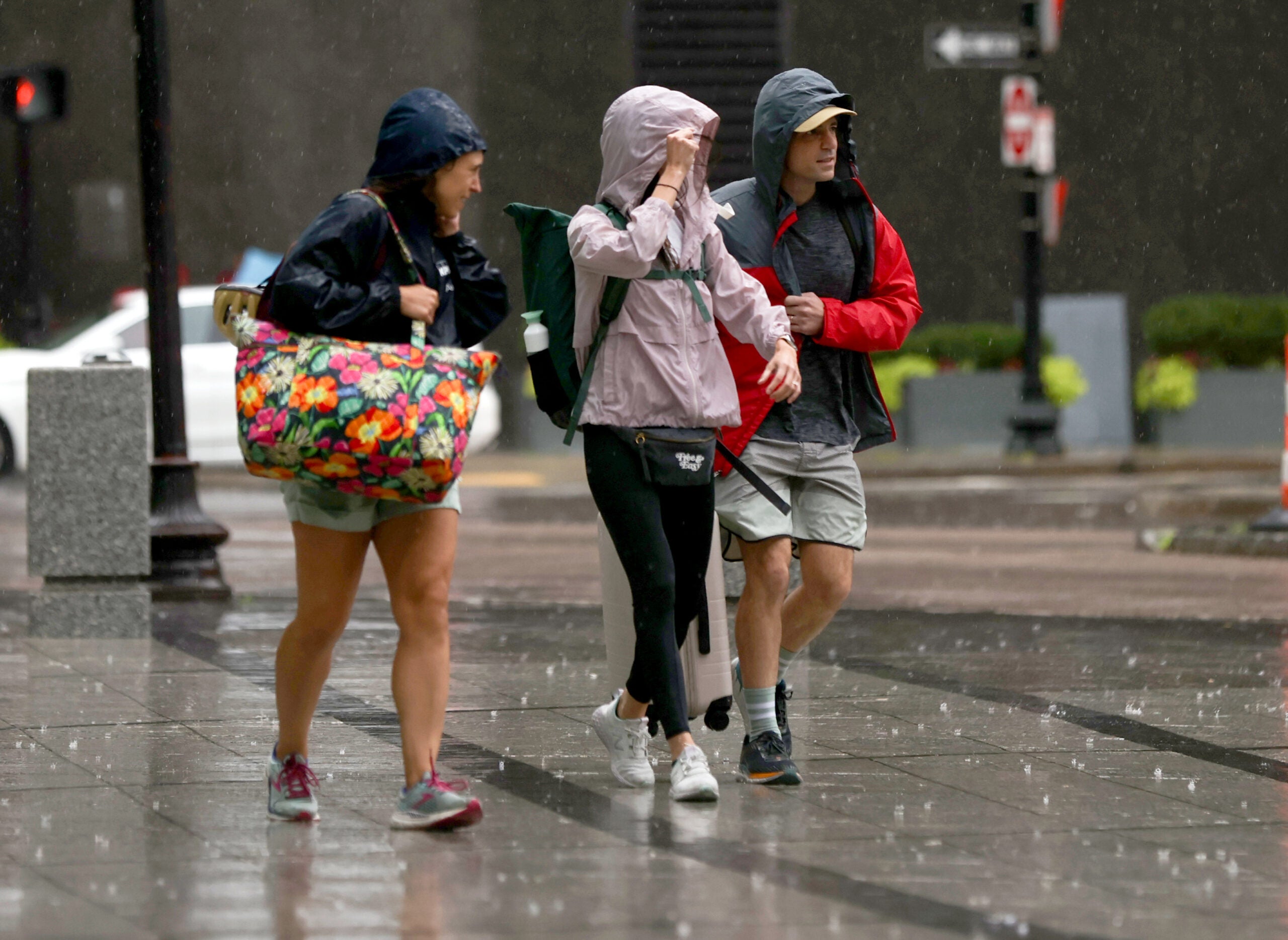 Heavy rain in Boston on Summer street and Atlantic Avenue.