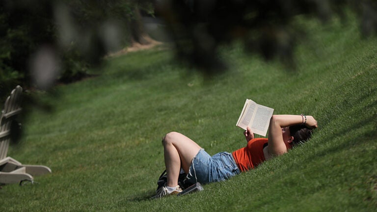 Boston weather -- , MA., 09/05/2023, At Boston University, senior Julia Samuels, cq, spends some of her first day of the school year on BU Beach with a book.