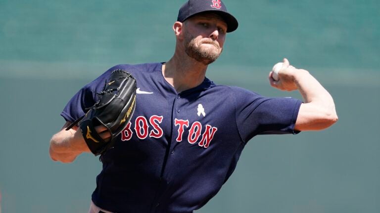 Boston Red Sox starting pitcher Chris Sale throws to a Tampa Bay