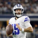 Dallas Cowboys quarterback Will Grier (15) prepares to throw a pass during a preseason NFL Football game in Arlington, Texas, Saturday, Aug. 26, 2023.
