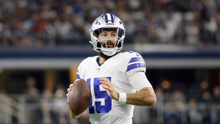 Dallas Cowboys quarterback Will Grier (15) prepares to throw a pass during a preseason NFL Football game in Arlington, Texas, Saturday, Aug. 26, 2023.