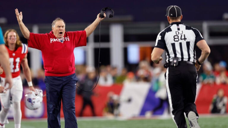 New England Patriots head coach Bill Belichick argues with officials after a call during the fourth quarter of an NFL football game against the Miami Dolphins, Sunday, Sept. 17, 2023, in Foxborough, Mass.