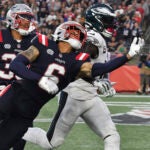 New England Patriots cornerback Christian Gonzalez (6)cbreaks up a pass intended for Philadelphia Eagles wide receiver A.J. Brown, right, in the second half of an NFL football game, Sunday, Sept. 10, 2023, in Foxborough, Mass.