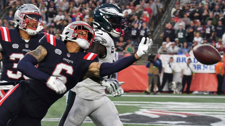 New England Patriots cornerback Christian Gonzalez (6)cbreaks up a pass intended for Philadelphia Eagles wide receiver A.J. Brown, right, in the second half of an NFL football game, Sunday, Sept. 10, 2023, in Foxborough, Mass.