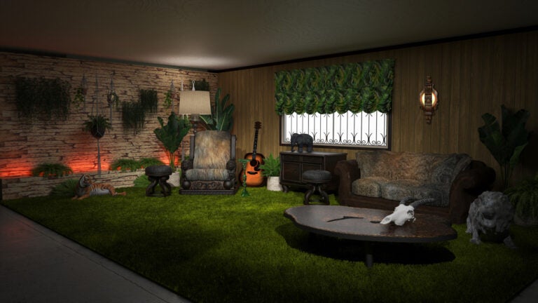 Photo of a room with green shag carpet, wooden furniture, and a wall made of rock material known as the "Jungle Room" at Graceland, Elvis Presley's estate.