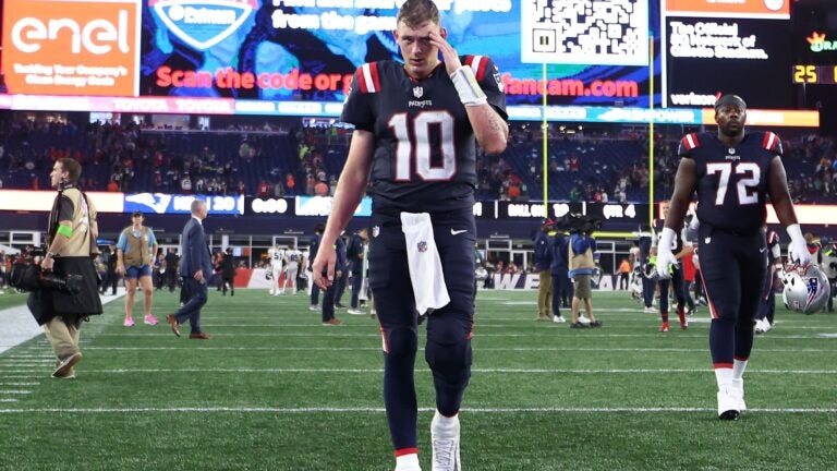 Mac Jones #10 of the New England Patriots walks off the field after his team's 25-20 loss against the Philadelphia Eagles at Gillette Stadium on September 10, 2023 in Foxborough, Massachusetts.