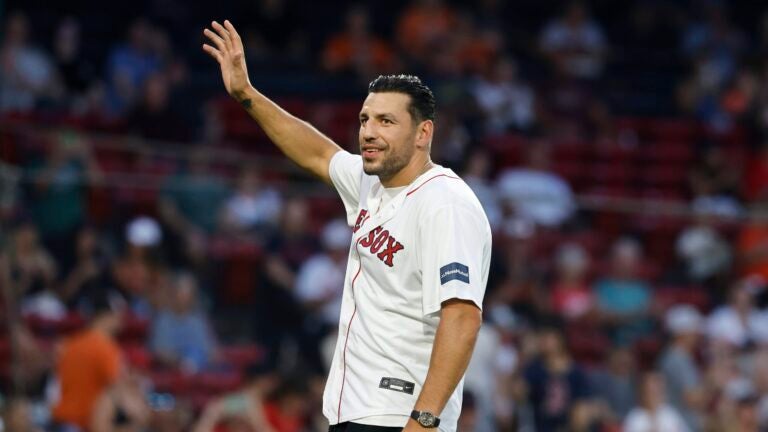 Boston Bruins' Milan Lucic waves before throwing out the ceremonial first pitch prior to a baseball game between he Boston Red Sox and the Baltimore Orioles, Friday, Sept. 8, 2023, in Boston.