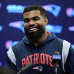 New England Patriots running back Ezekiel Elliott faces reporters.