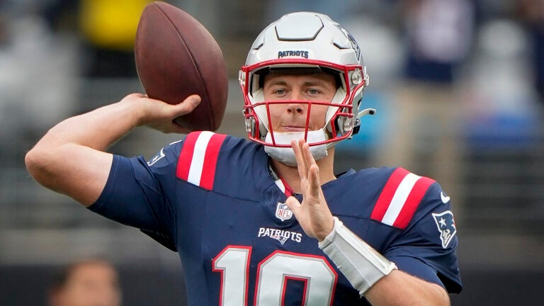New England Patriots quarterback Mac Jones (10) warms up before an NFL football game against the New York Jets on Sunday Sept. 24, 2023, in New York.