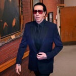 Musical artist Marilyn Manson leaves after appearing in Belknap Superior Court.