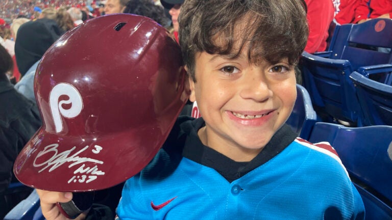 Phillies' Bryce Harper ejected, tosses helmet into stands to NJ boy