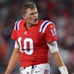 Mac Jones #10 of the New England Patriots reacts after officials overturned a spot to turn the ball over and end the game \amia at Gillette Stadium on September 17, 2023 in Foxborough, Massachusetts.