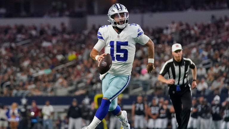 Dallas Cowboys quarterback Will Grier runs with the ball during the first half of a preseason NFL football game against the Las Vegas Raiders in Arlington, Texas, Saturday, Aug. 26, 2023.