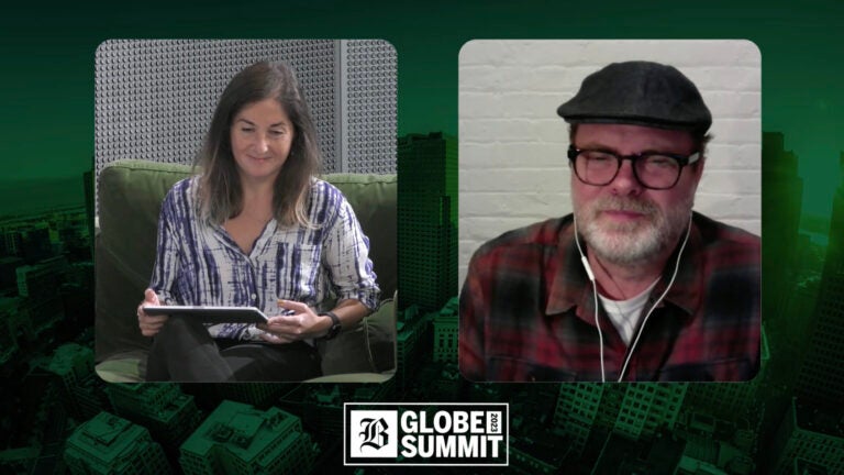 Rainn Wilson and Boston Globe reporter Sabrina Shankman chat during the 2023 Globe Summit.