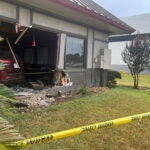 This image provided by the Rosenberg Police Department shows police tape in front of a Denny's restaurant after a vehicle crashed into it in Rosenberg, Texas, Monday, Sept. 4, 2023.