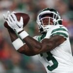 Cornerback Sauce Gardner #1 of the New York Jets intercepts a pass from the Buffalo Bills during the second quarter of the NFL game at MetLife Stadium on September 11, 2023 in East Rutherford, New Jersey.