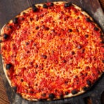 A picture of an original tomato pizza from Sally's Apizza.