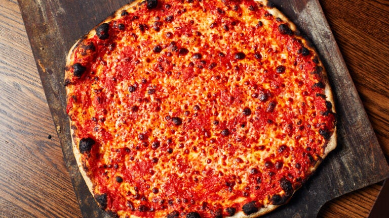 A picture of an original tomato pizza from Sally's Apizza.