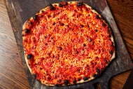 What is apizza? And where can you find it in the Boston area?